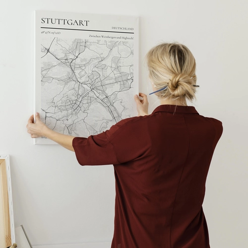 Custom city map of Stuttgart with a quote as a poster on the wall